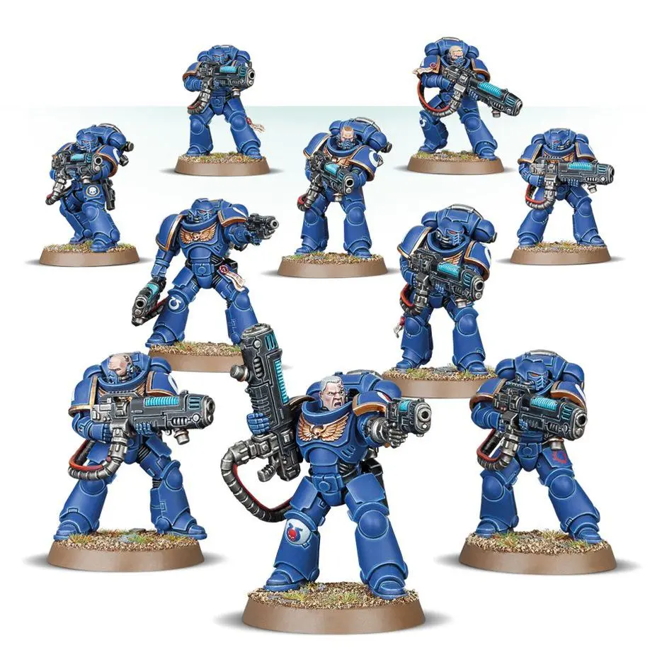 A group of blue-armored miniature soldiers with weapons on bases.