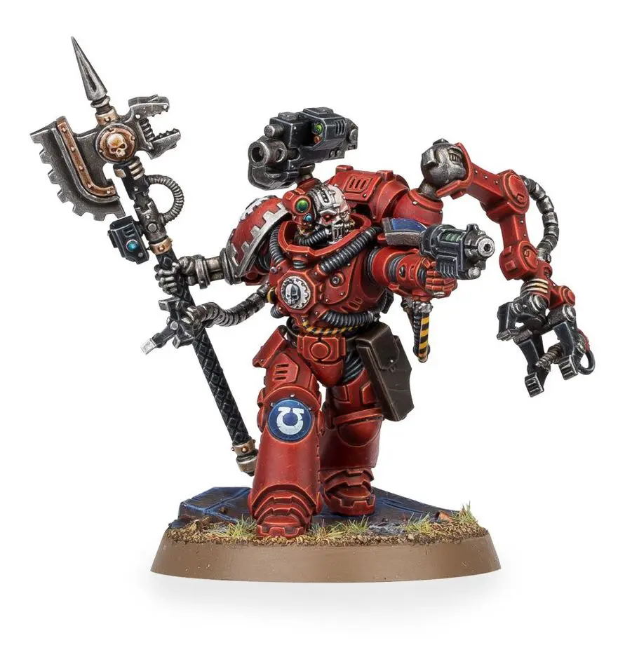 A detailed miniature of a red-armored warrior with a mechanical staff and robotic arm.