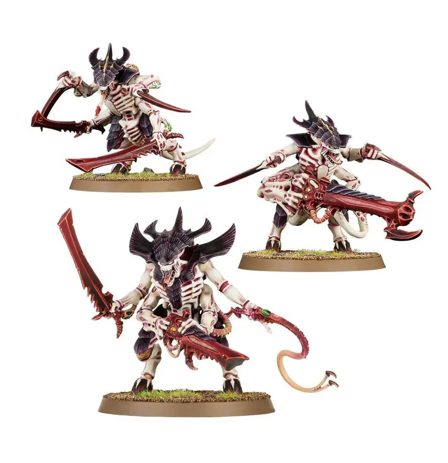 Three detailed warrior miniatures wielding swords and axes with horned helmets.