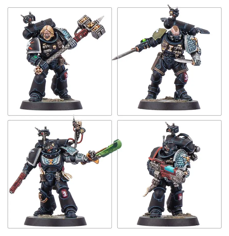 Four detailed miniature warriors in futuristic armor with weapons and gear.