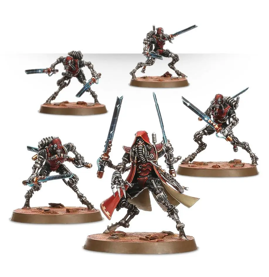 Five intricately painted sci-fi warrior miniatures with weapons.
