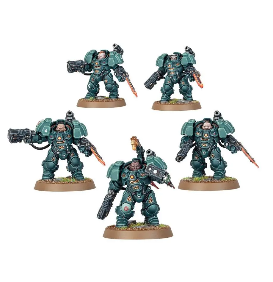 Five detailed miniature soldiers in green armor with weapons, posed on small round bases.