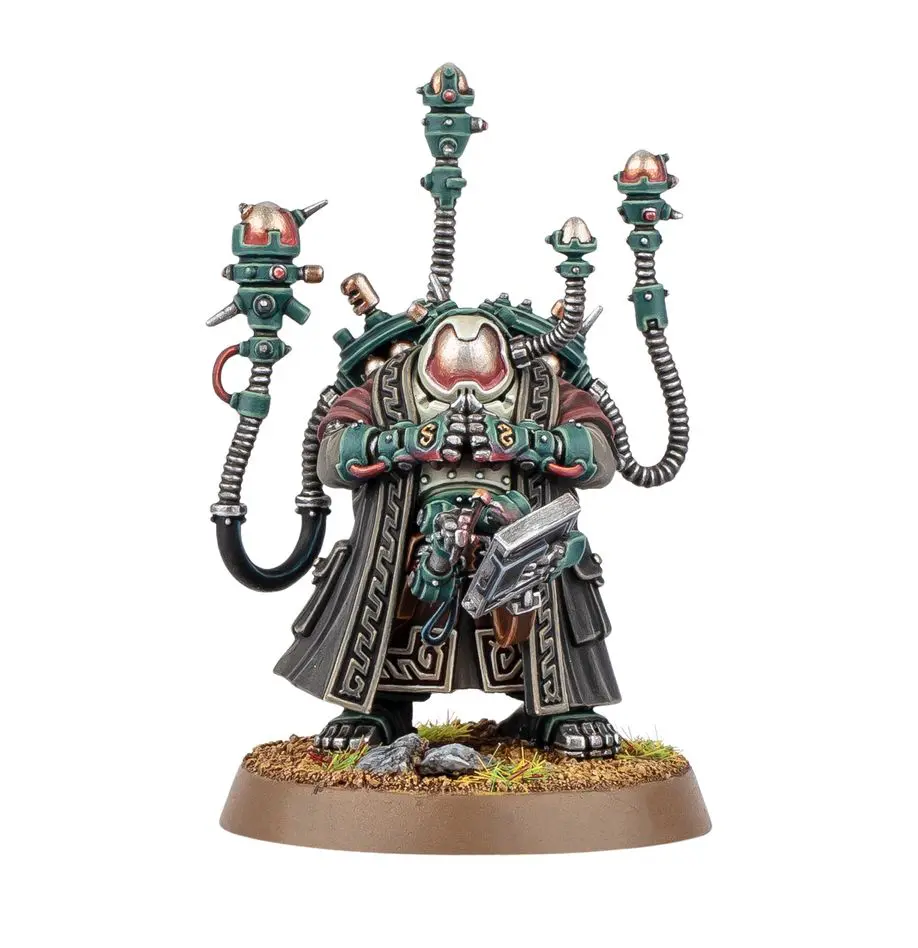 A detailed miniature of a mechanical robot with ornate pipes and armor.