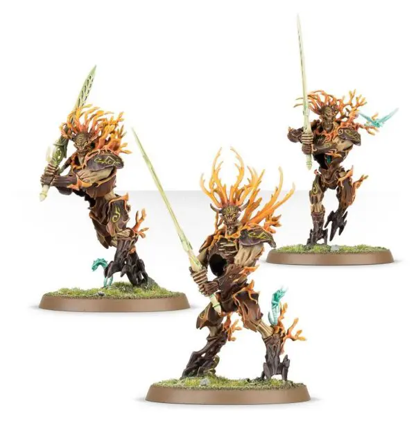 Three detailed fantasy warrior miniatures with spiked armor and weapons.